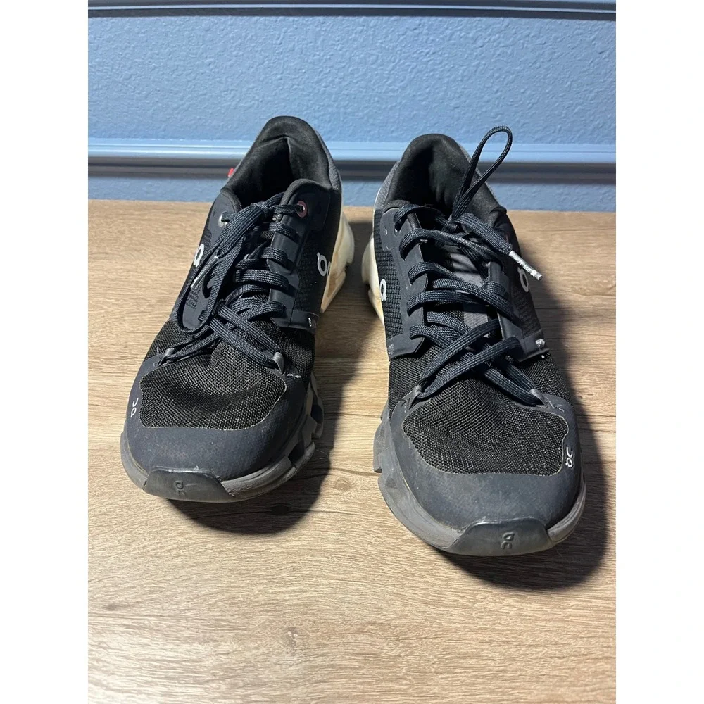 On Cloudnovel Women's Black and Cream Athletic Shoes